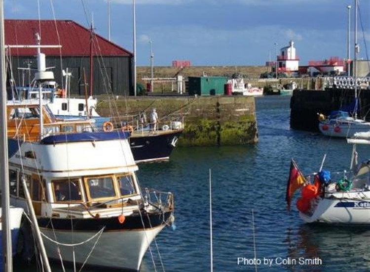 Arbroath. yacht just entering through the lock gate into the marina.jpg
