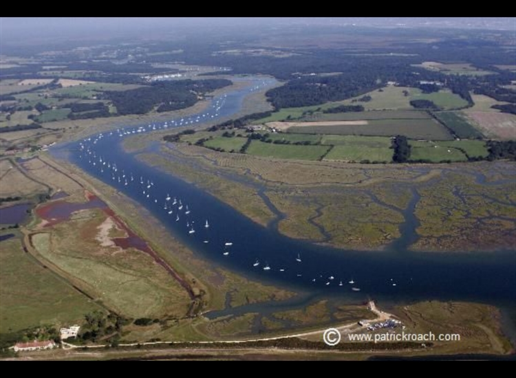 Beaulieu River looking north wth Bucklers Hard in the distance