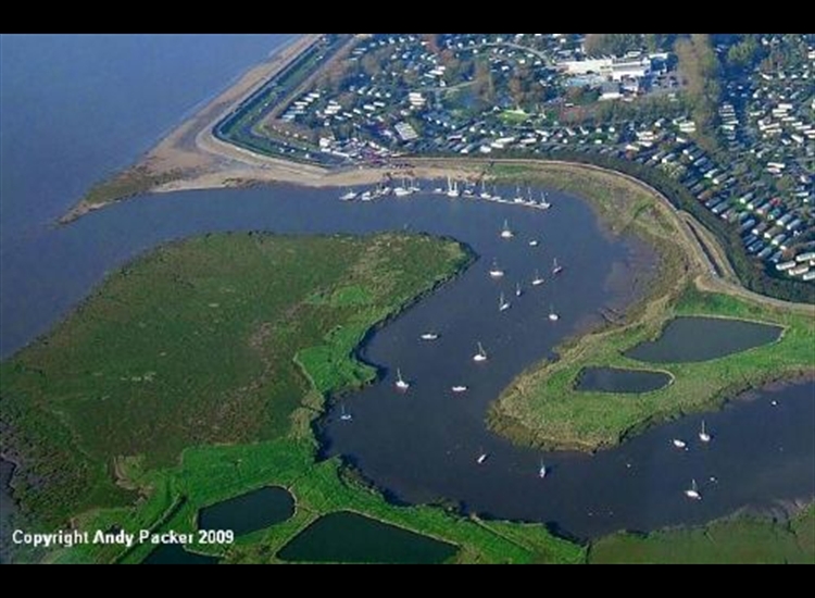 Aerial view of Burnmam on Sea Motorboat and Sailing Clubs' visitors pontoon, showing approach