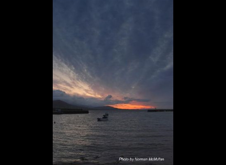 Sunrise thro' entrance to Carlingford Harbour. Sun bears ENE in summer