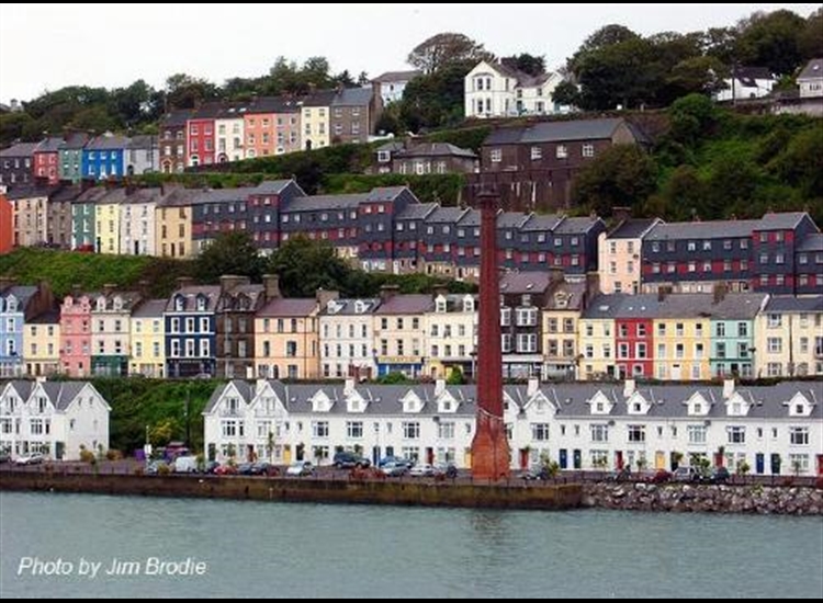 Cobh. Chimney stack on sea front at Cobh