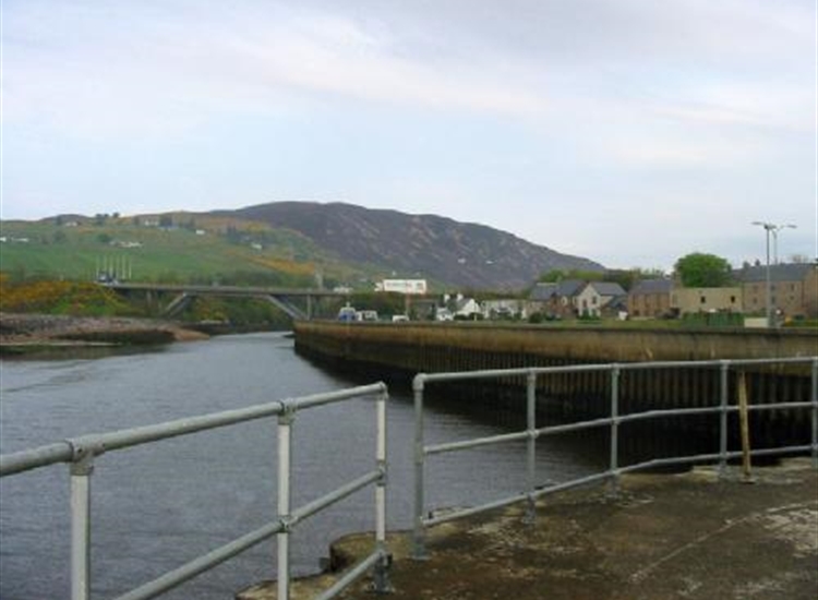Helmsdale looking up river with harbour entrance right foreground
