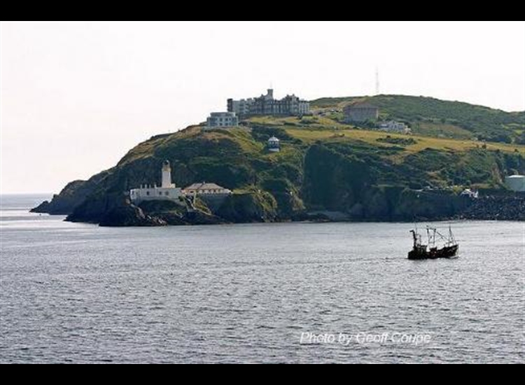 Douglas Head from the NE. Beam trawler is running towards harbour mouth
