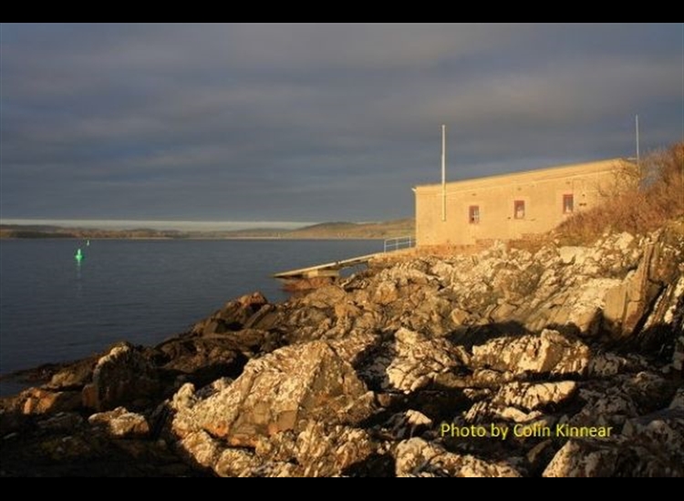 Lifeboat station at the entrance to the channel