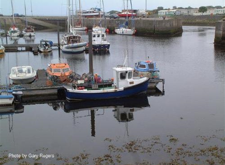 Nairn Marina showing the entrance and visiting boats against the wall