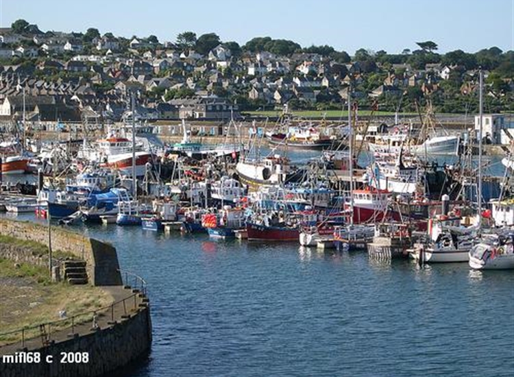 Photo taken from the old Quay looking towards the new pontoons with a couple of visiting yachts