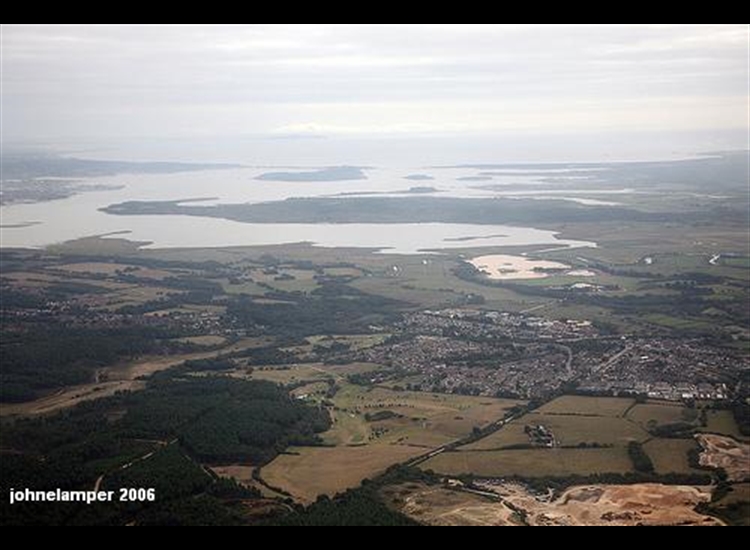 Aerial shot Wareham looking over Poole Harbour