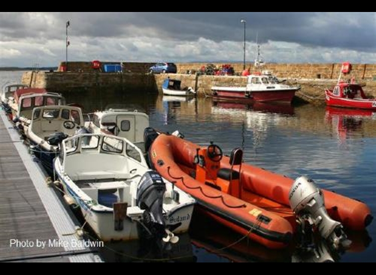 Portmahomack harbour. Caution, if rafting against that red Nicholson, it leans out!!.jpg