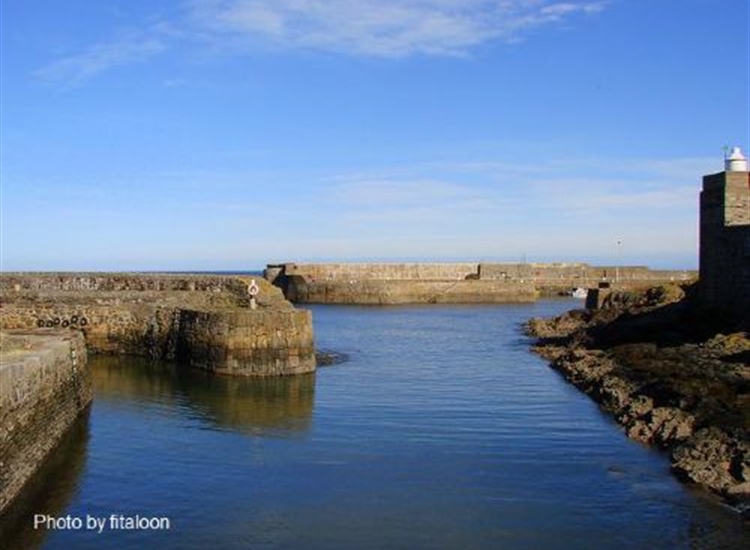 Portsoy. Both harbour entrances from the South