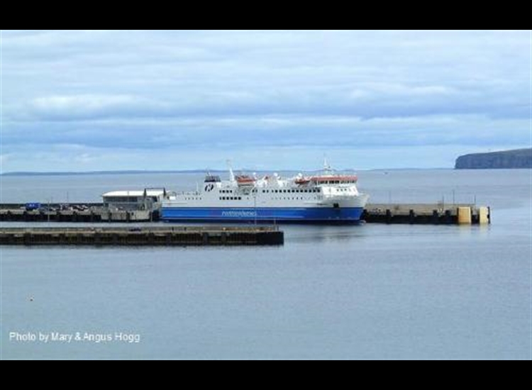 Scrabster. RoRo ferry looking NE with Dunnet Head middle right and Hoy on the skyline