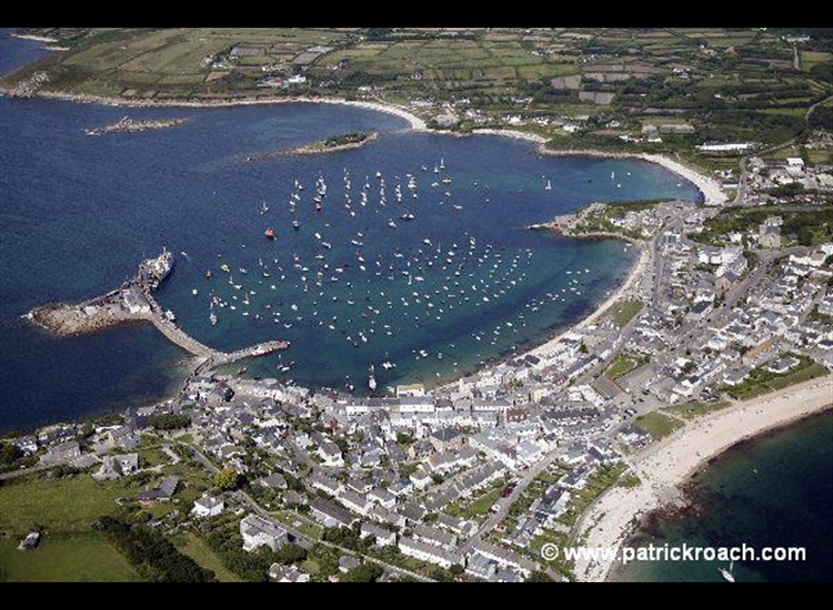 St Mary's Harbour with Porth Cressa Beach bottom right