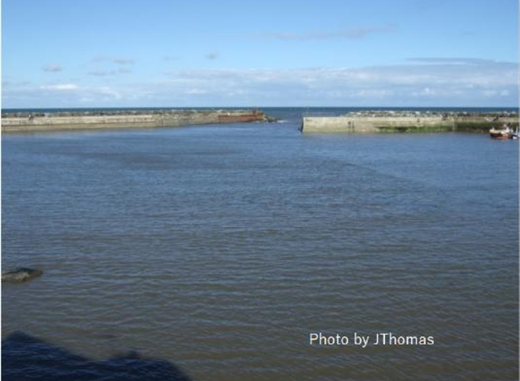 Looking towards Harbour entrance from the beach