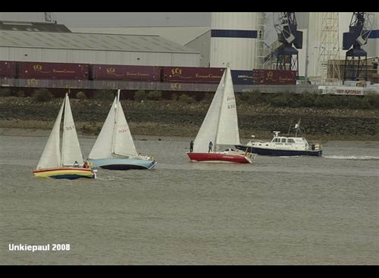 Yachts being herded on Thames